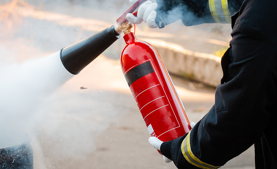 image of a fire extinguisher in use