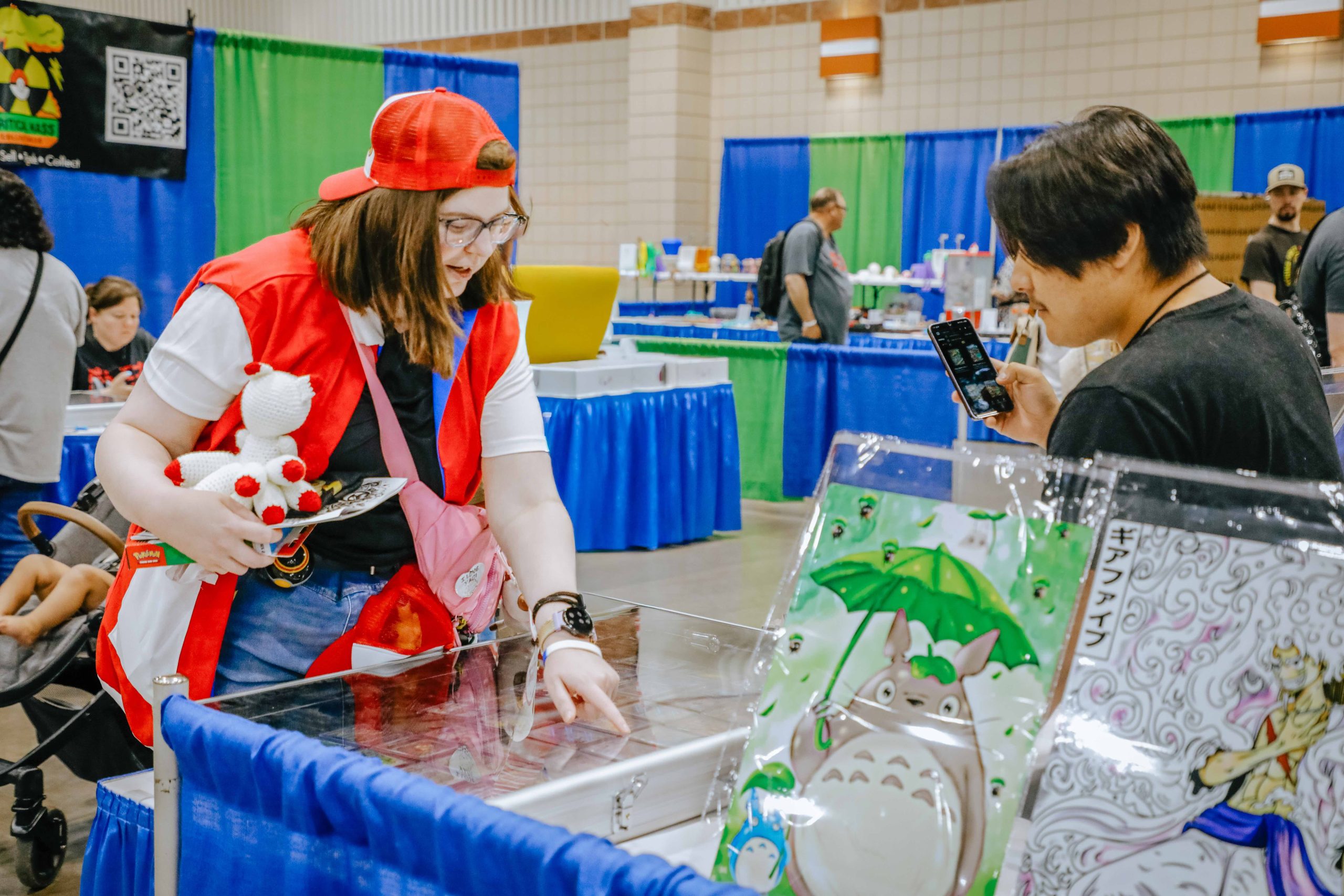 A patron talking to a vendor at the 2026 AMA-CON event