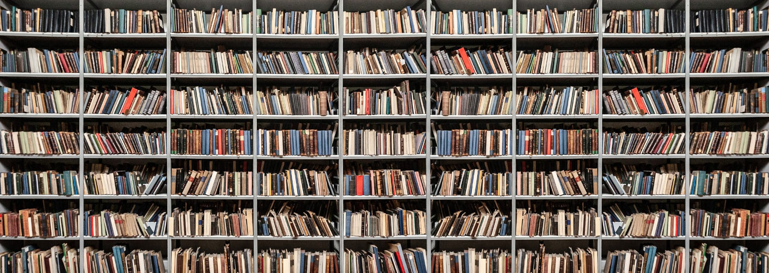 A row of library stacks filled with books
