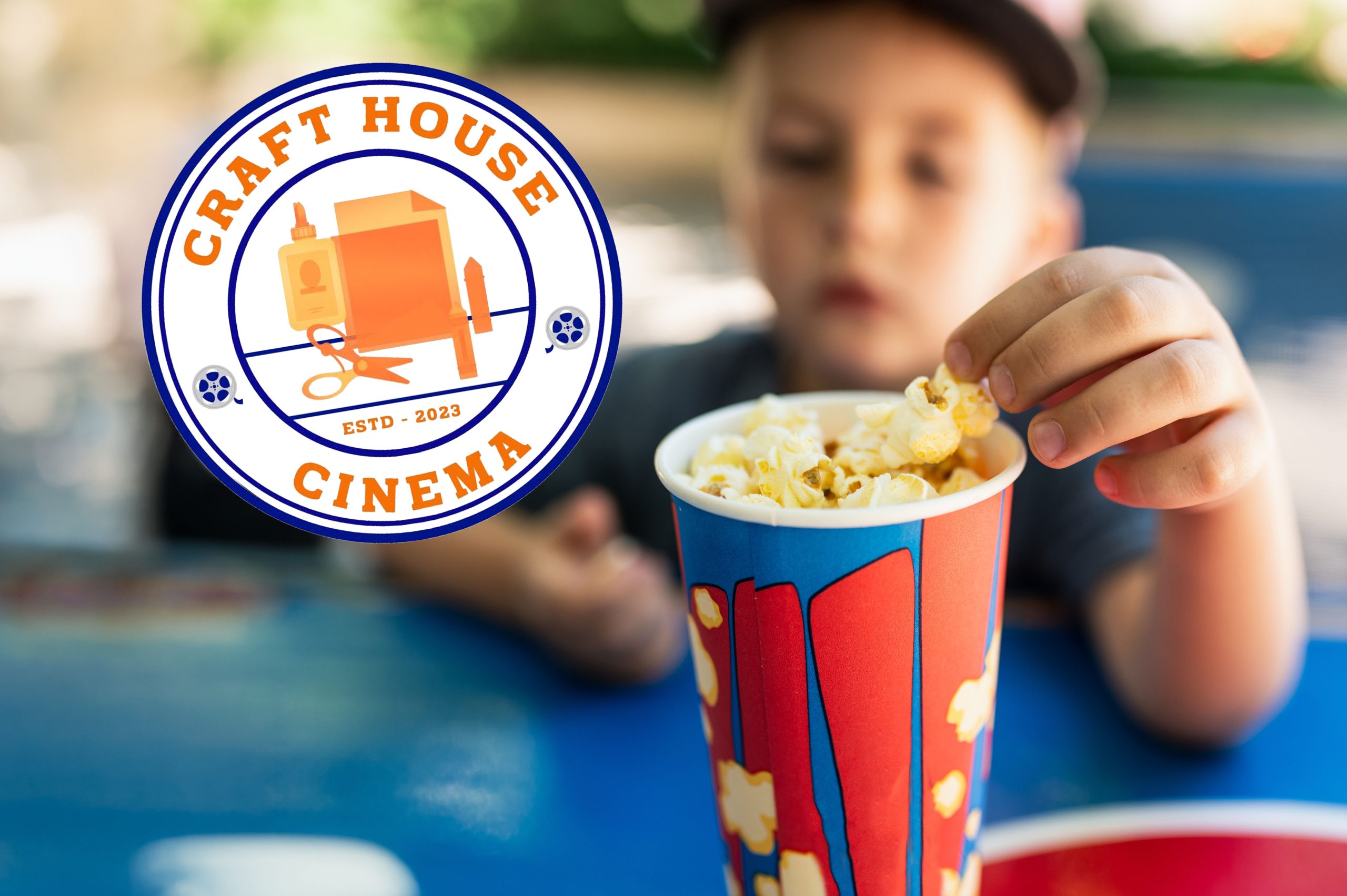 A child reaching into a cup of popcorn with the Crafthouse Cinema logo overlayed