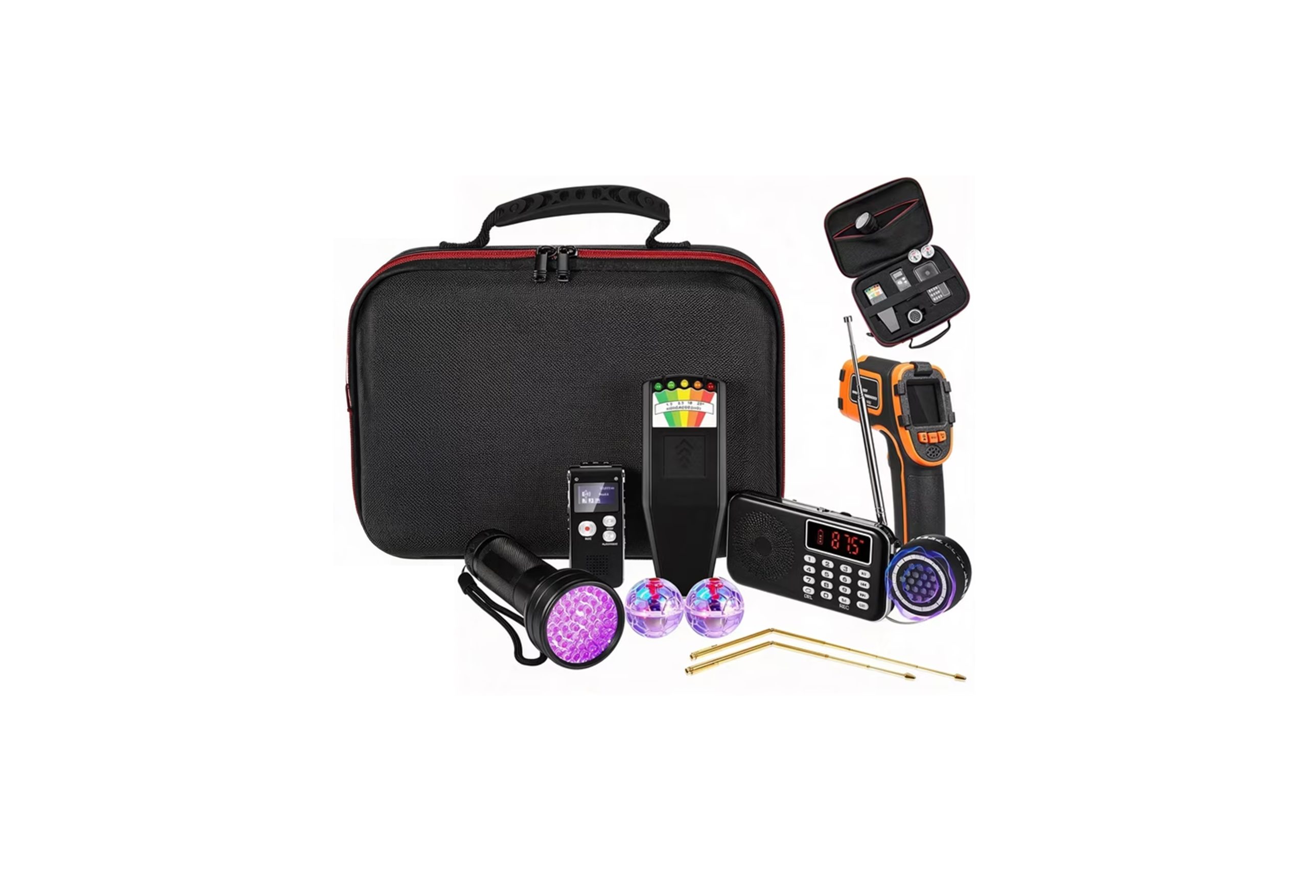 A variety of ghost hunting supplies next to a black case