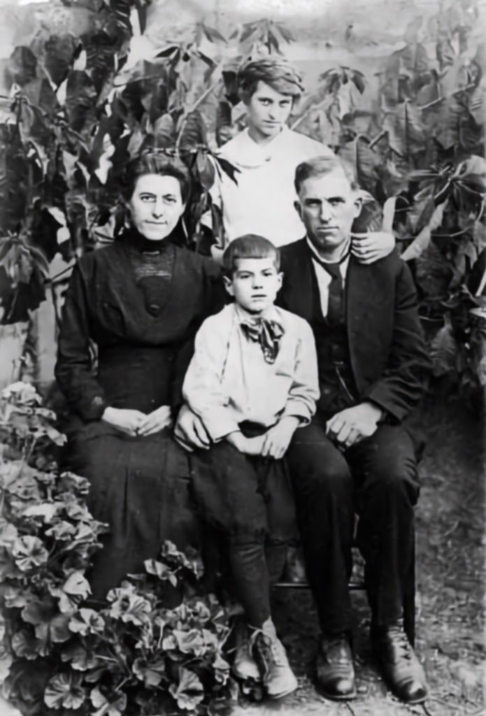 Rev. Leonidas Cicero Kirkes with his wife and sons