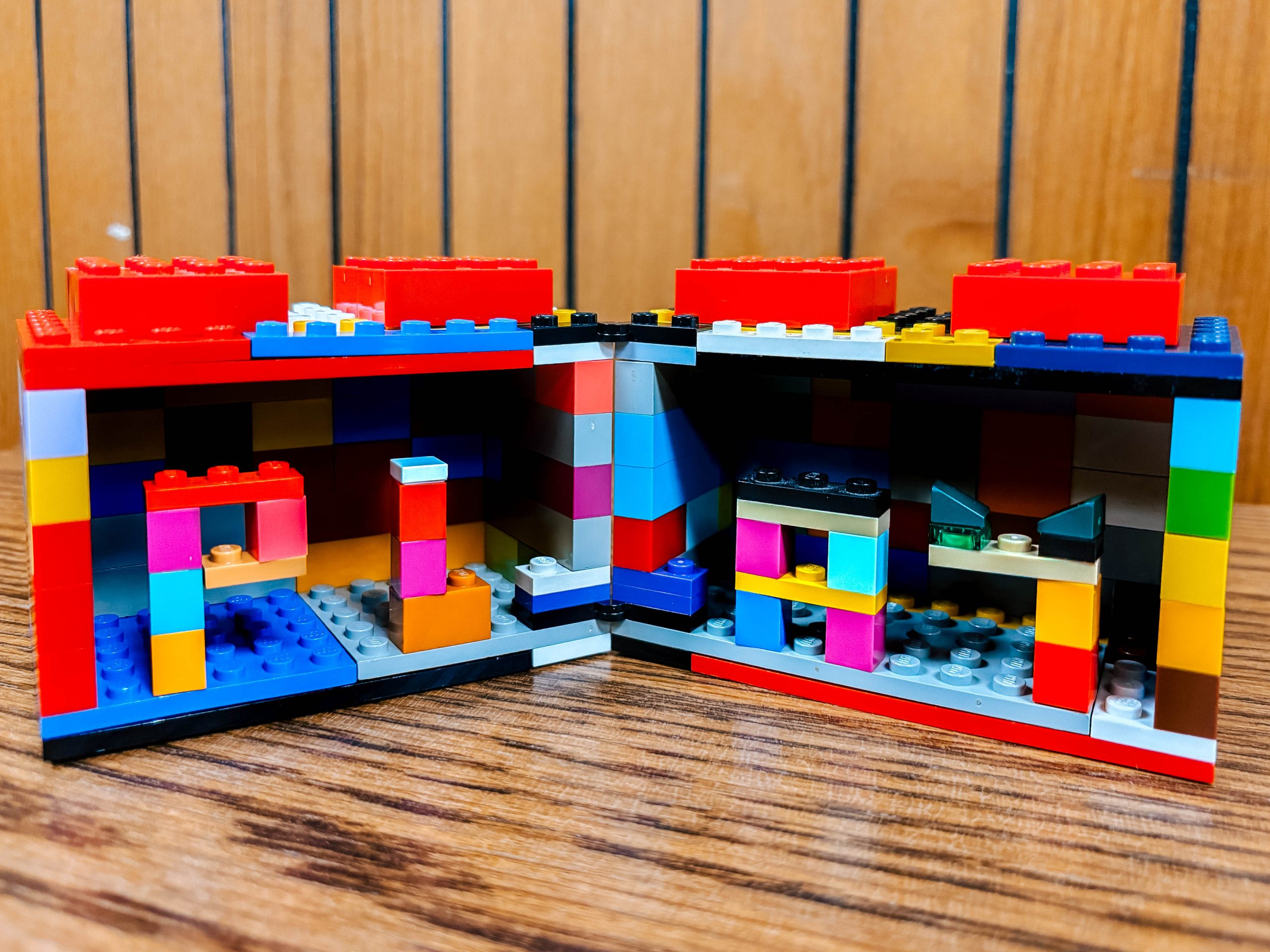 A lego build with the pieces spelling out the word "play"